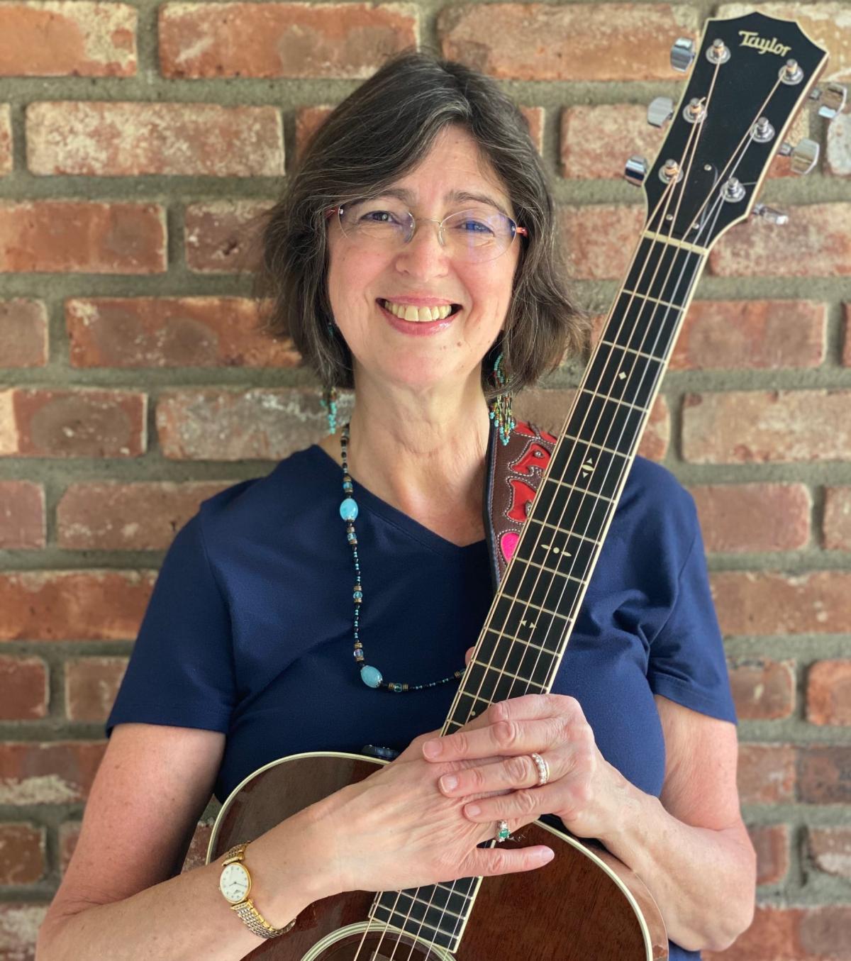 Miss Fran with her guitar 